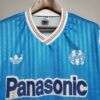 Zoom sur les logos du maillot vintage Olympique de Marseille Extérieur 1989/1991.