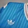 Zoom sur le logo du maillot vintage Olympique de Marseille Extérieur 1989/1991.