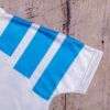 Zoom sur la manche du maillot OM Ligue des Champions 1993