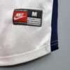 Zoom sur le logo du maillot vintage Paris Saint-Germain Extérieur 1998/1999.