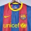 Détail des logos sur le maillot Barcelone 2011