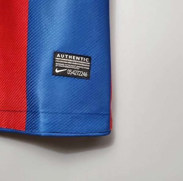 Détail de l'étiquette sur le maillot Barcelone 2011