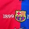 Zoom sur les logos du maillot Barca 1999
