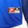 Zoom sur le logo du maillot Barca 1999