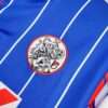 Zoom sur le logo du maillot vintage Ajax Amsterdam Extérieur 1989/1990