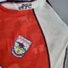Zoom sur le logo et coutures du maillot vintage Arsenal Domicile 1990/1992