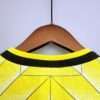 Présente le col du maillot vintage Borussia Dortmund Domicile 1988/1989