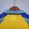 Présente le col du maillot vintage Chelsea Extérieur 1996/1998