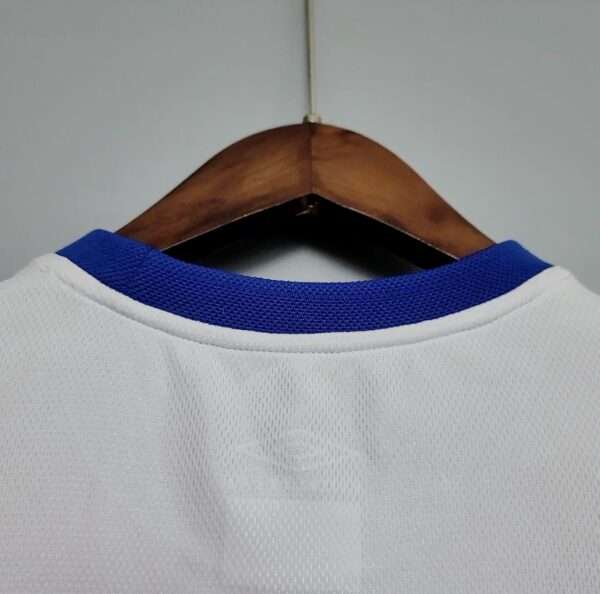 Présente le col du maillot vintage Chelsea Extérieur 2003/2005