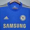 Zoom sur les logos et col du maillot vintage Chelsea Domicile 2012/2013