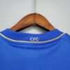 Présente le col du maillot vintage Chelsea Domicile 2012/2013