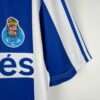 Présente la manche et logos du maillot vintage FC Porto Domicile 1990/1992