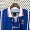 Présente le col et logos du maillot vintage France Domicile Euro 1996
