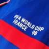 Zoom sur le logo et coutures du maillot vintage France Finale Coupe du Monde 1998