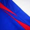 Zoom sur les coutures du maillot vintage France Domicile Coupe du Monde 2006