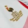 Zoom sur le logo et coutures du maillot vintage France Finale Coupe du Monde 2006