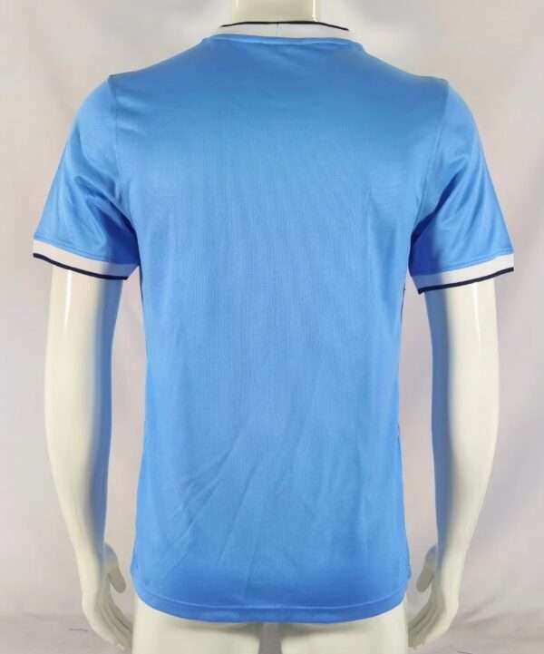 Vue arrière du maillot vintage Manchester City Domicile 2013/2014