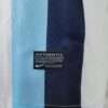 Zoom sur le logo et coutures du maillot vintage Manchester City "Troisième" 2013/2014