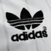 Zoom sur le logo du maillot vintage Manchester United Finale FA Cup 1983