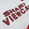 Zoom sur le logo du maillot vintage Manchester United Extérieur 1997/1999