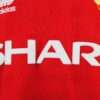 Zoom sur les logos du maillot vintage Manchester United Domicile 1988/1990