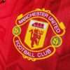 Zoom sur le logo du maillot vintage Manchester United Domicile 1992/1994