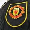 Zoom sur le logo du maillot vintage Manchester United Extérieur 1993/1994