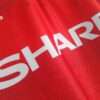 Zoom sur le logo du maillot vintage Manchester United Domicile 1994/1996