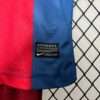Zoom sur le logo et coutures du maillot FC Barcelone "Enfant" Domicile 2010/2011