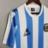 Zoom sur la manche, col et logos du maillot vintage Argentine Domicile Coupe du Monde 1986