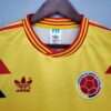Présente le col et logos du maillot vintage Colombie Extérieur Coupe du Monde 1990