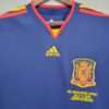 Zoom sur les logos et col du maillot vintage Espagne Finale Coupe du Monde 2010