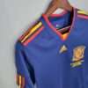 Zoom sur les logos, manche et col du maillot vintage Espagne Finale Coupe du Monde 2010