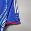 Zoom sur la manche et coutures du maillot vintage Japon Domicile Coupe du Monde 2006