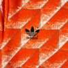 Zoom sur le logo du maillot vintage Pays-Bas Domicile 1988