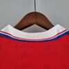 Présente le col et coutures du maillot vintage Universidad Católica Extérieur 1996/1997