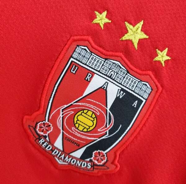 Zoom sur le logo du maillot vintage Urawa Red Diamonds Domicile 2008/2009