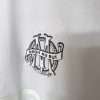 Zoom sur le logo du maillot vintage Olympique de Marseille "125 Ans"