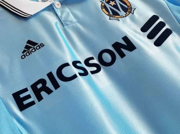 Zoom sur les logo du maillot vintage Olympique de Marseille Extérieur "Centenaire" 1998/1999