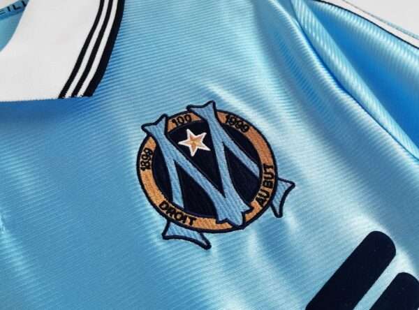 Zoom sur le logo du maillot vintage Olympique de Marseille Extérieur "Centenaire" 1998/1999