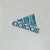 Zoom sur le logo du maillot vintage Olympique de Marseille Domicile 2003/2004